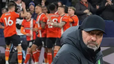  Klopp very smiling watching a Luton player