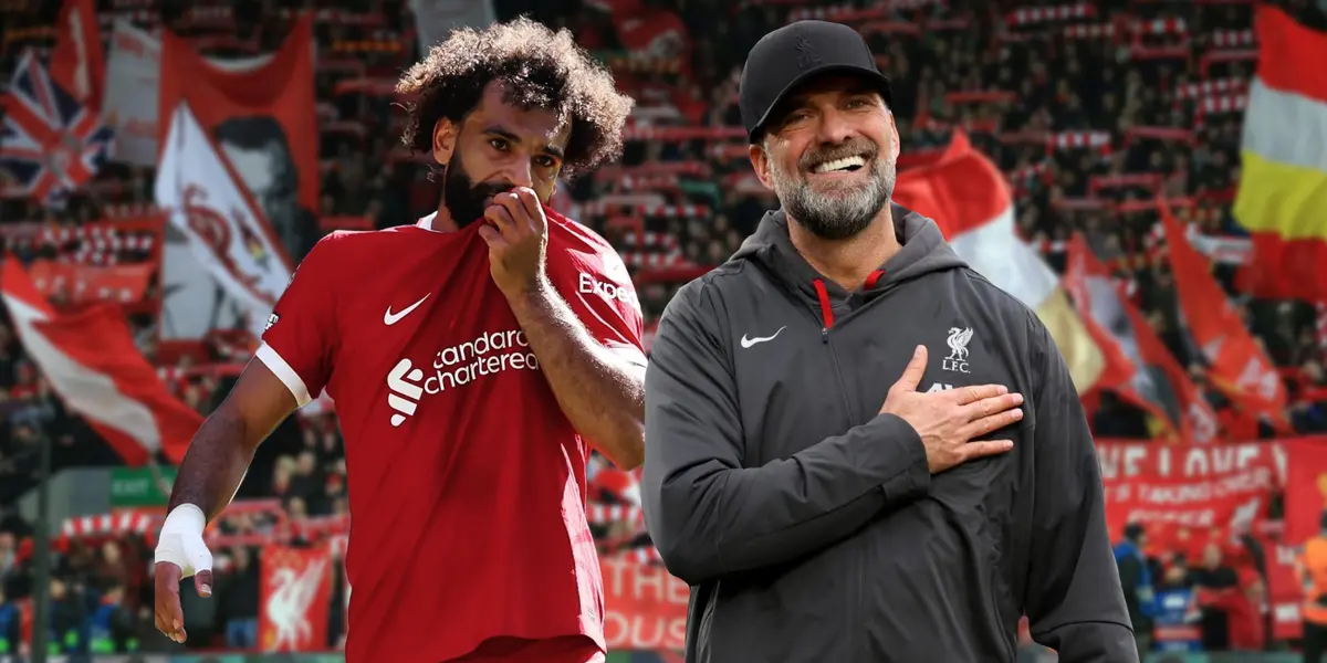 Happy Klopp and Salah kissing the club's shield