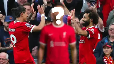 Salah and Nuñez celebrating and an unknown player